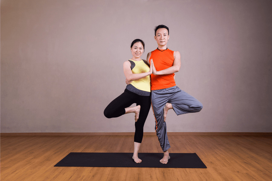 Partner Yoga: How to Do the Partner Tree Pose and Yoga Miracle